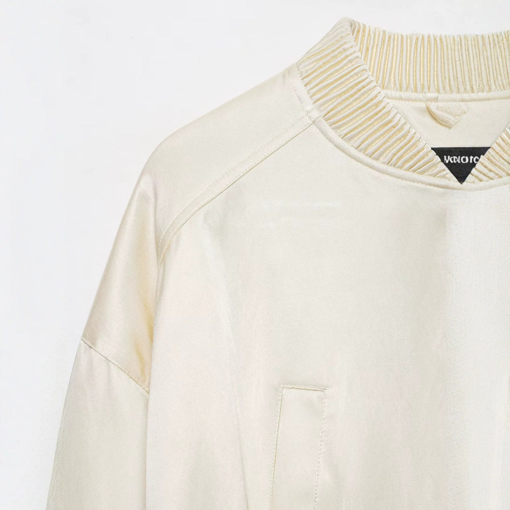 Chaqueta bomber holgada beige con cremallera