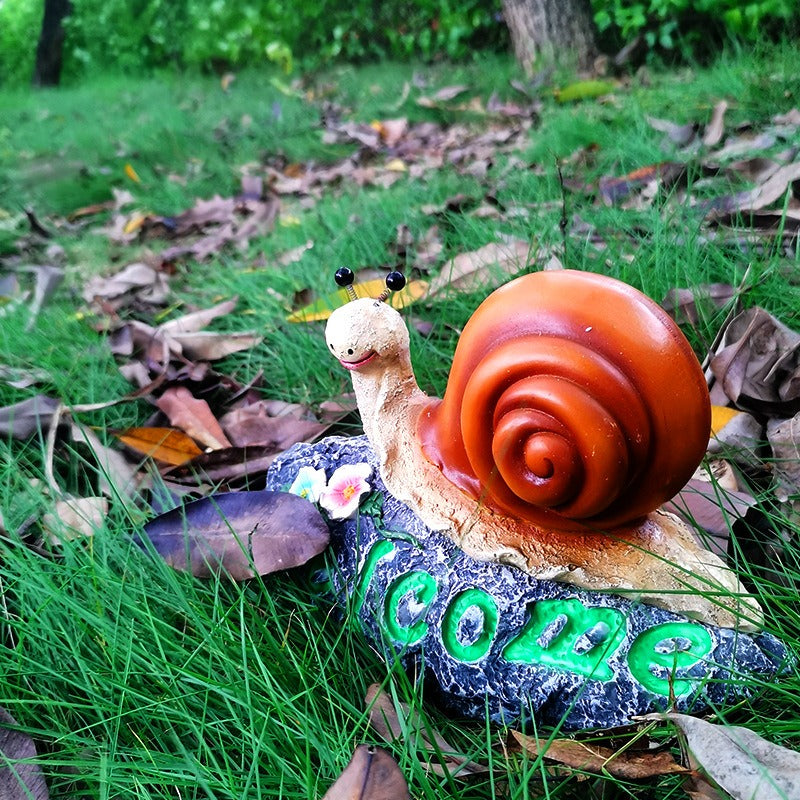 Adorno de caracol con bienvenida para jardín