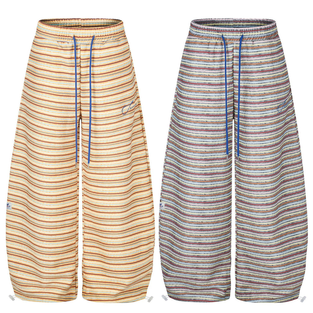 Pantalón deportivo de pierna curva con franjas a contraste
