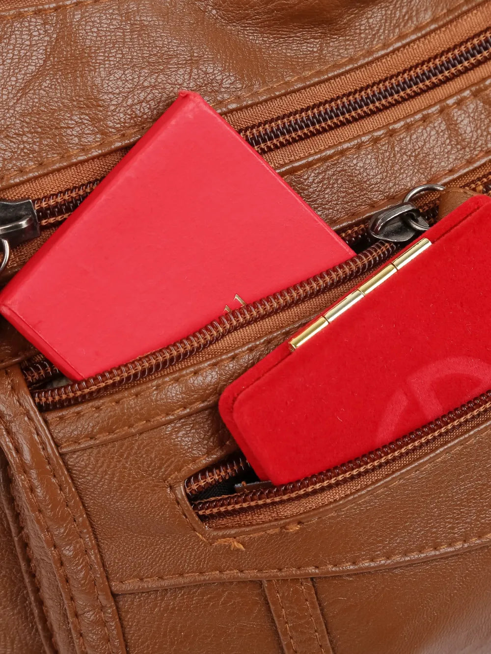 Bolso bandolera con varios compartimentos de 26 × 18 × 9 cm