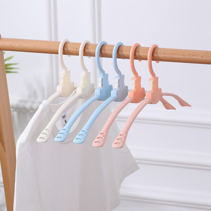 Percha plegable de plástico para viaje