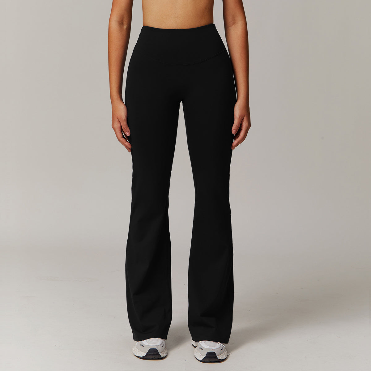 Pantalón deportivo acampanado de cintura alta