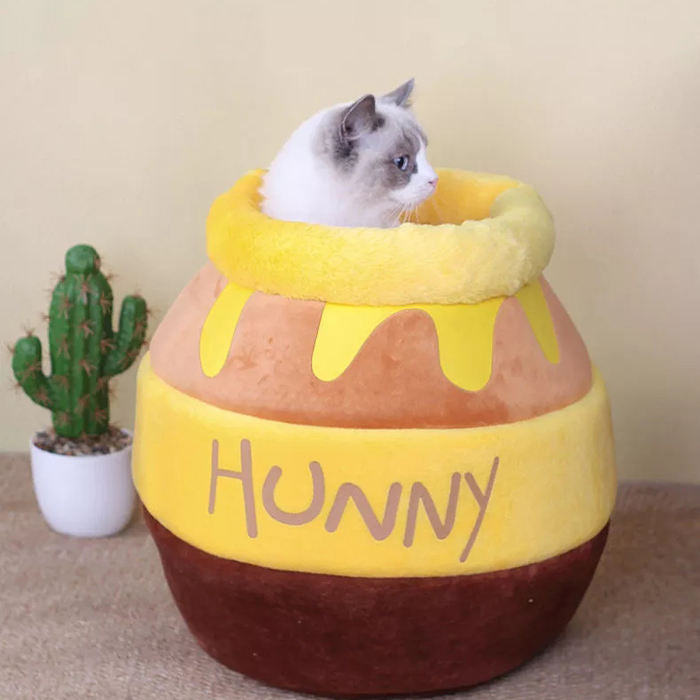 Cama para mascotas con forma de tarro de miel
