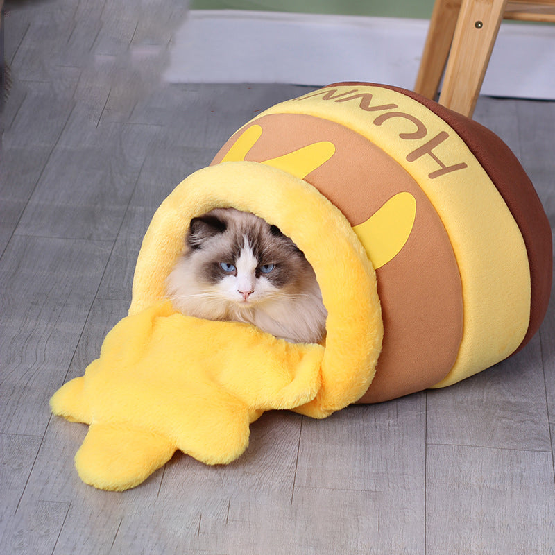 Cama para mascotas con forma de tarro de miel
